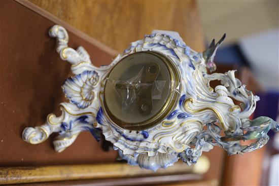 A Meissen flower encrusted mantel clock, late 19th century, H. 34.5cm, restored